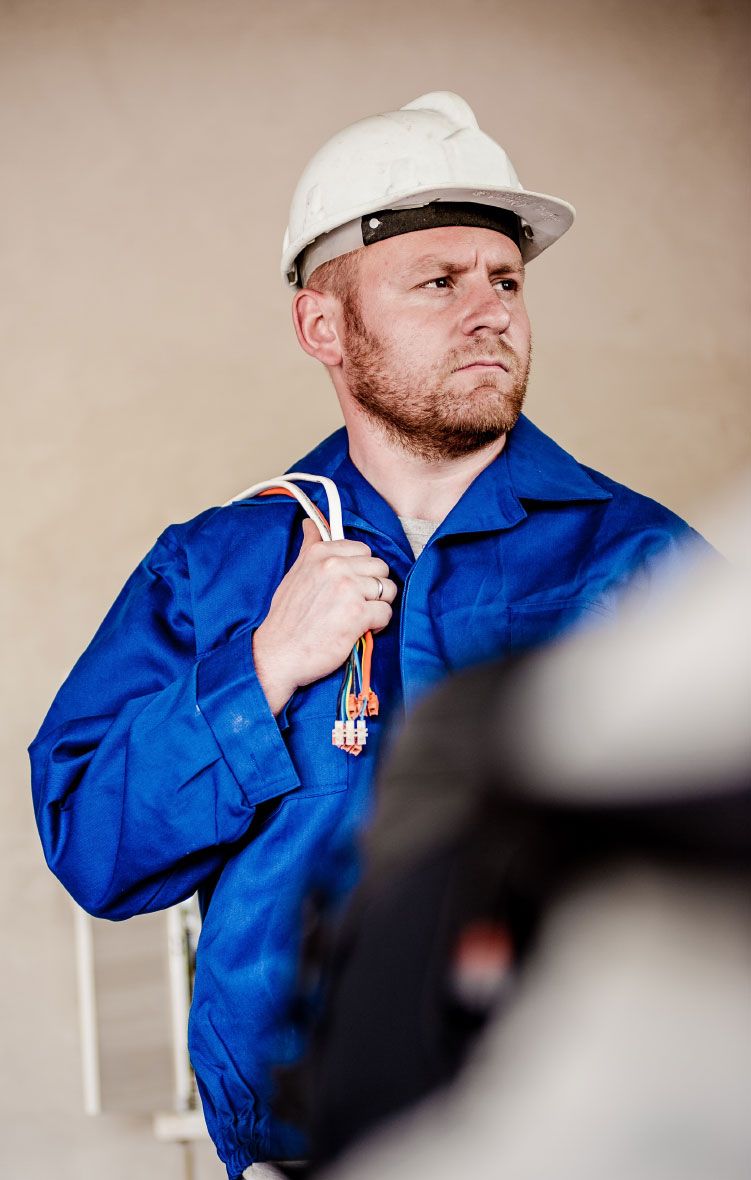 Electrician with Cables over Shoulder 2 Electrician with Cables over Shoulder 2